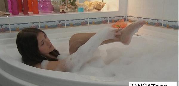  Cute teen is caught masturbating in the bath